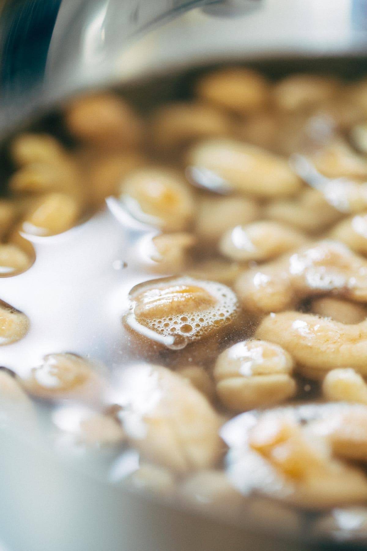 Cashew Sauce! Just four easy ingredients: cashews, garlic, salt, and water! Perfect base sauce recipe for pasta, dips, or cheesy sauce alternatives. Vegan. | pinchofyum.com