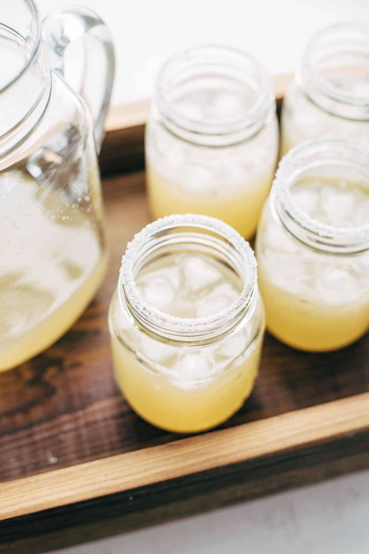 Pitcher Margaritas for a Crowd - all you need is simple syrup, lime juice, and tequila. These make THE BEST party drinks! | pinchofyum.com
