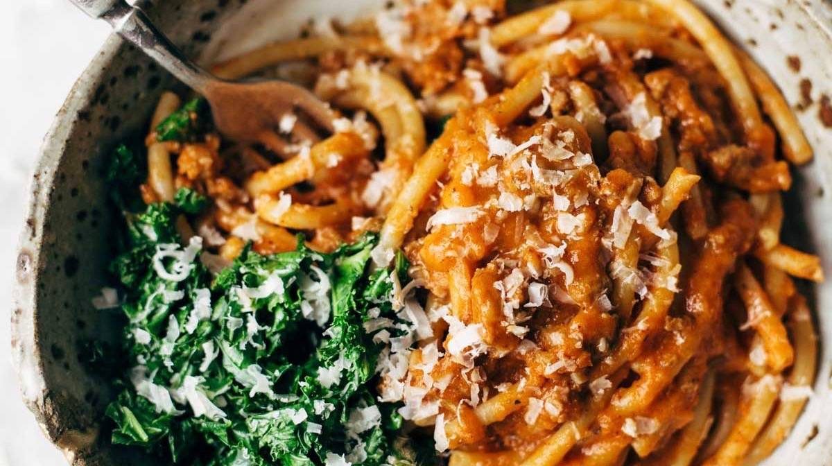Pumpkin Spaghetti in a bowl with kale.