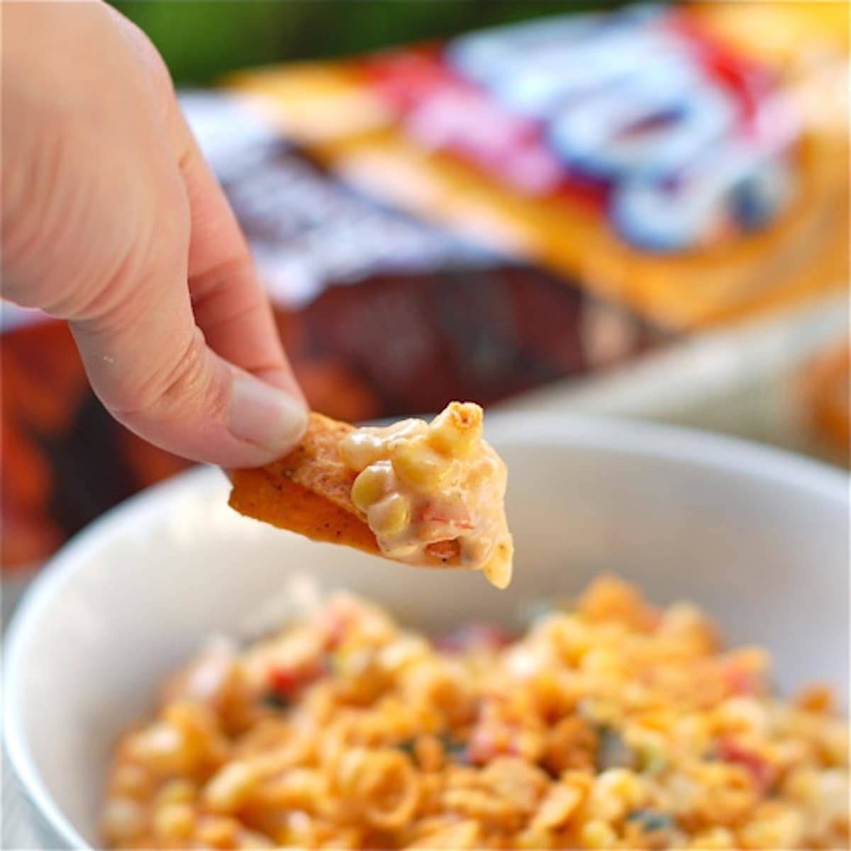 Spicy corn salad on a frito.