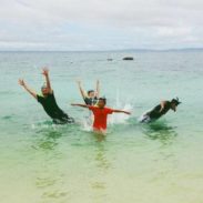 Lindsay's family in the water in Cebu.