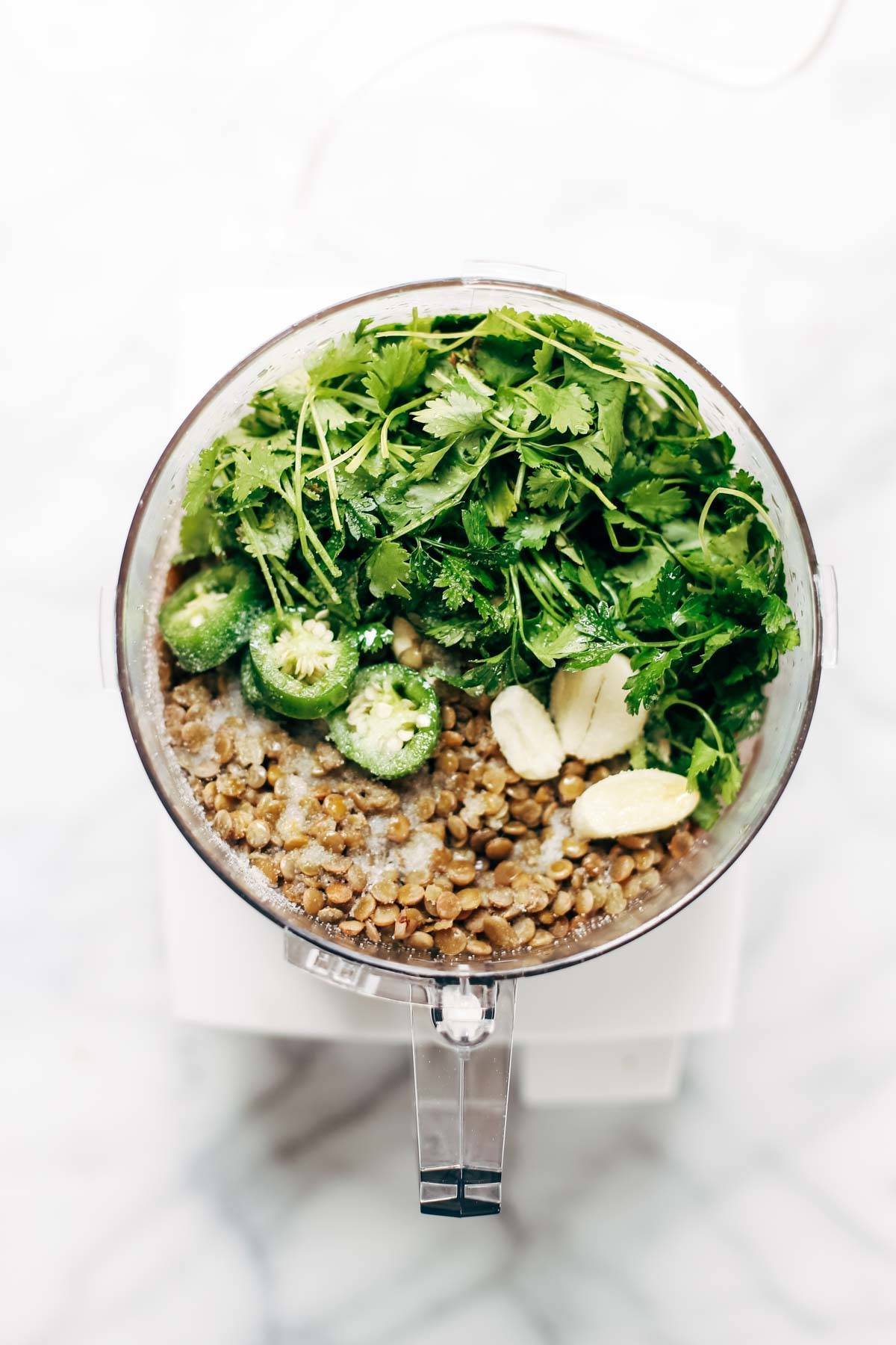 Naan-wich: 5 ingredient falafel, roasted veggies, and avocado sauce stuffed between pillowy garlic naan. Best sandwich recipe I've ever made. | pinchofyum.com