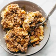 Cinnamon Streusel French Toast Cups on a plate with a fork.