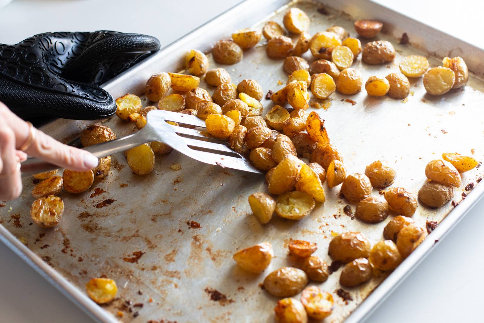 Roasted potatoes on a sheet pan.