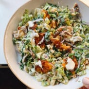 Smashed potato salad in a bowl.